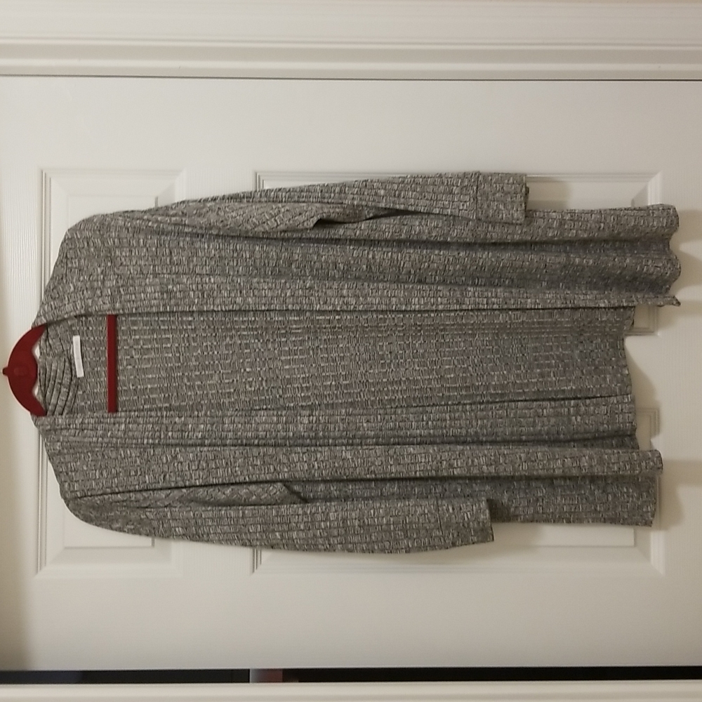Linda Mathews long sleeved sweater with side slits